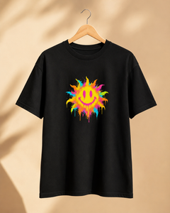 Black t-shirt with a colorful smiley face design on a beige background