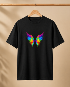 Black t-shirt with a colorful butterfly design on a beige background